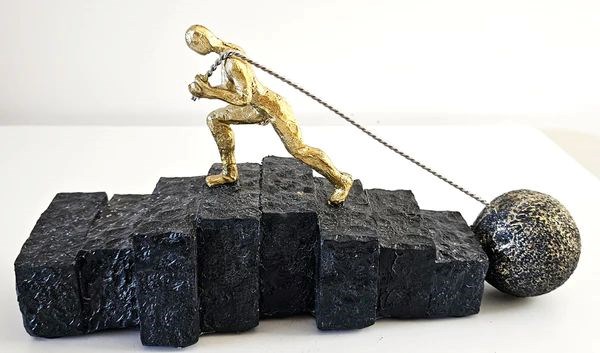 Man Pulling Small Ball